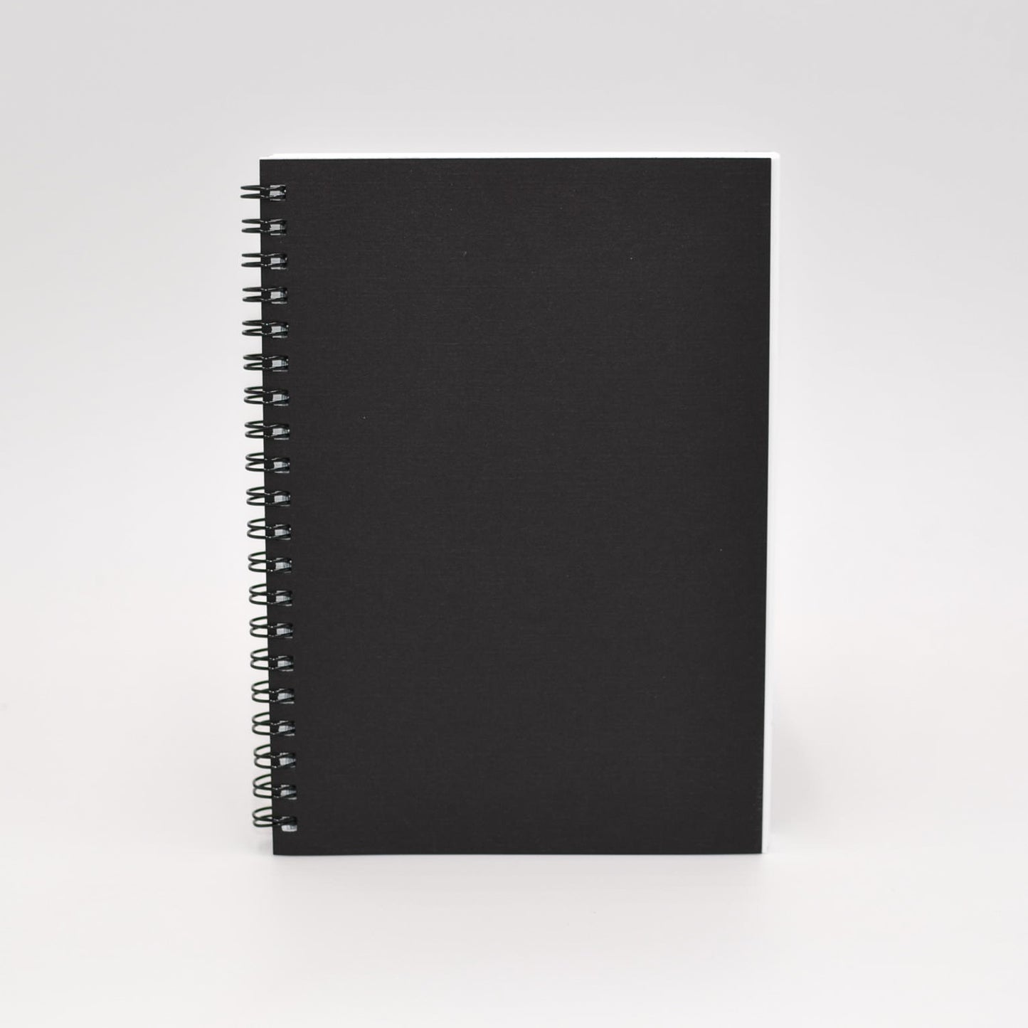 Journal Refill: 1272 Wirebound 5-1/2X7-3/4 Journals Black or Sand cover, white paper. Gray-lined or blank sheets. Wire-bound refill. Back to journal refill makes for easy insertion into your cover.