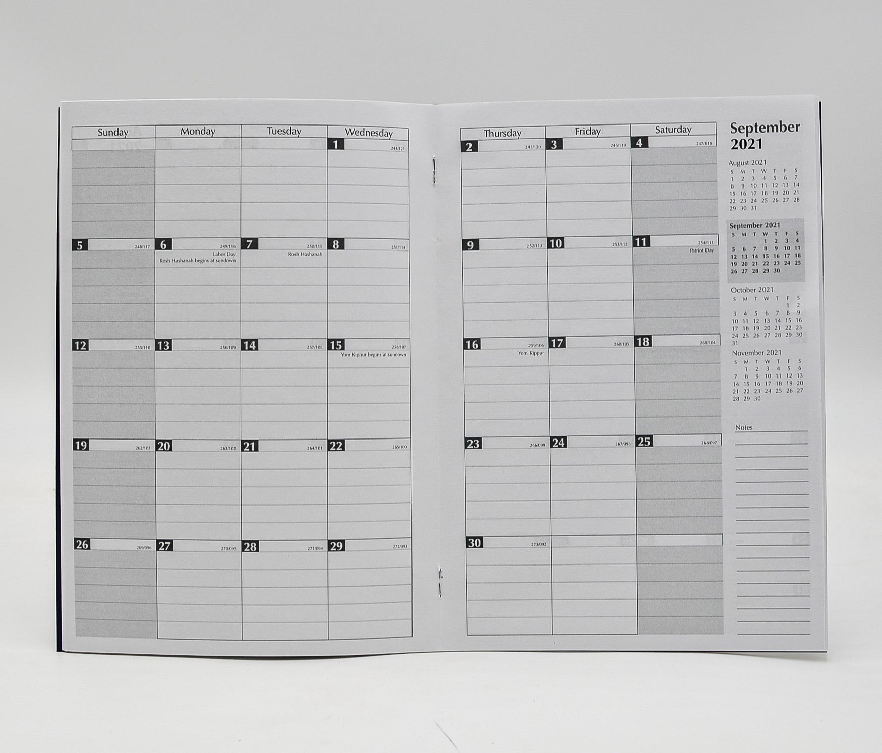 Monthly Calendar: 7" x 10" Staple Bound Leatherette Planner   January 2021-January 2022  Available in Forrest Green and Navy Blue  This Month-at-a-glance calendar includes additional pages, such as: personal information page, three year calendar, future planning for 2021 and 2022, metric conversion, special information, air distances, investment record, dividends & investment record, expense summary, telephone/address, important dates, special dates, area codes/time zones