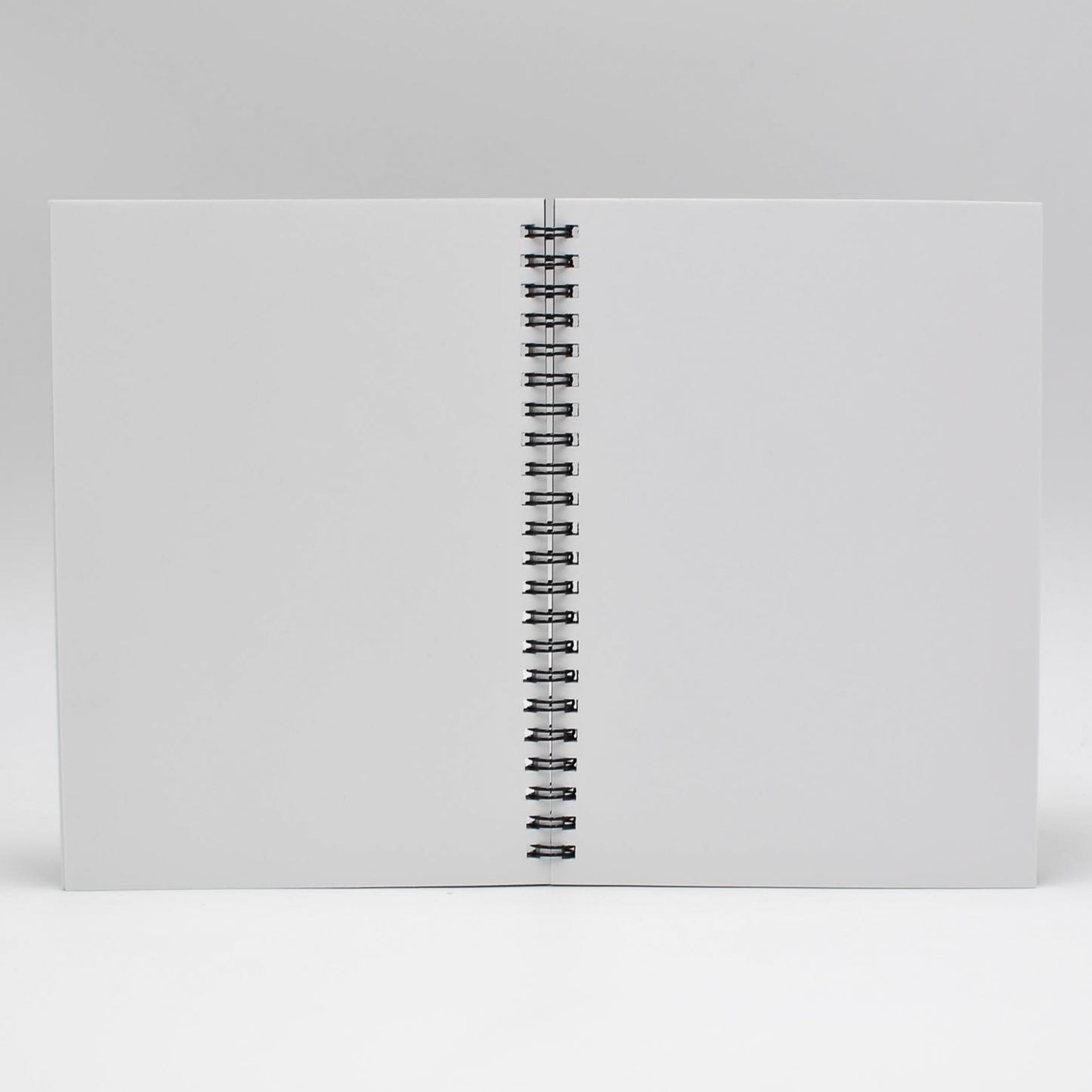 Journal Refill: 1272 Wirebound 5-1/2X7-3/4 Journals Black or Sand cover, white paper. Gray-lined or blank sheets. Wire-bound refill. Back to journal refill makes for easy insertion into your cover.