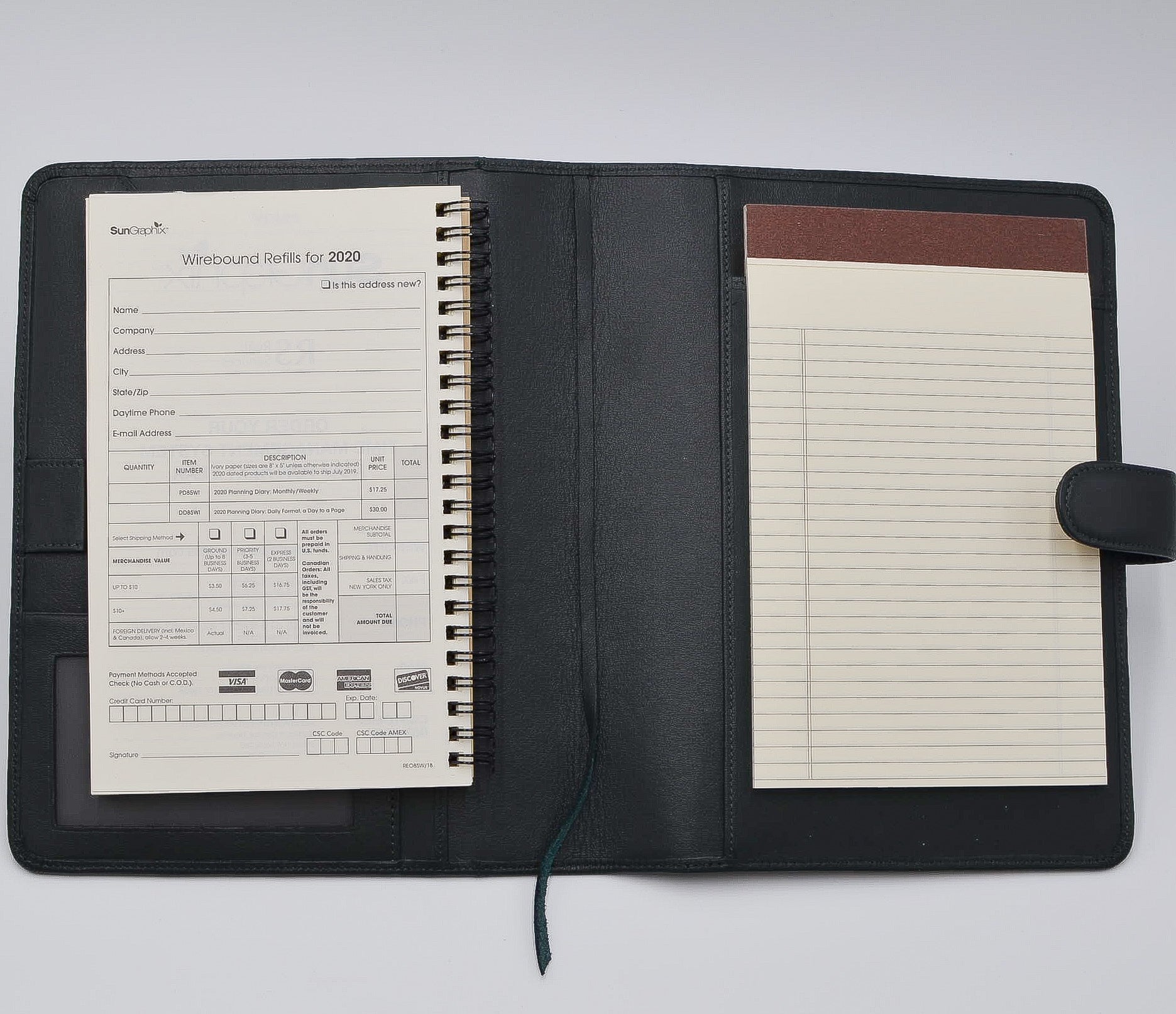 This leather cover is available in British Tan, Red, Burgundy, Green, Black, and Brown. This 7-1/2" x 9-3/4" cover accommodates wire bound and loose leaf inserts with an optional metal 3-ring binder. Keep yourself organized with ease with a snap closure, horizontal note pad holder, clear identification holder, document holder, and leather book mark.