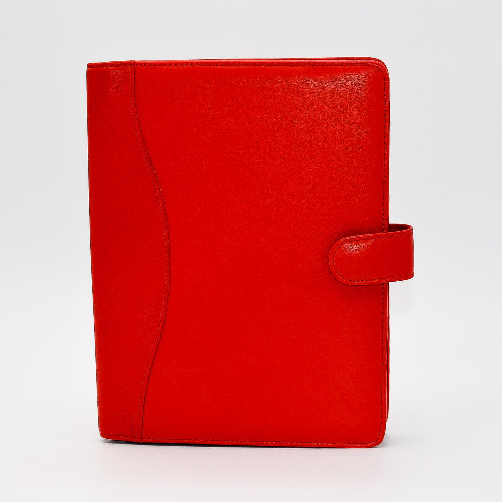 This leather cover is available in British Tan, Red, Burgundy, Green, Black, and Brown. This 7-1/2" x 9-3/4" cover accommodates wire bound and loose leaf inserts with an optional metal 3-ring binder. Keep yourself organized with ease with a snap closure, horizontal note pad holder, clear identification holder, document holder, and leather book mark.