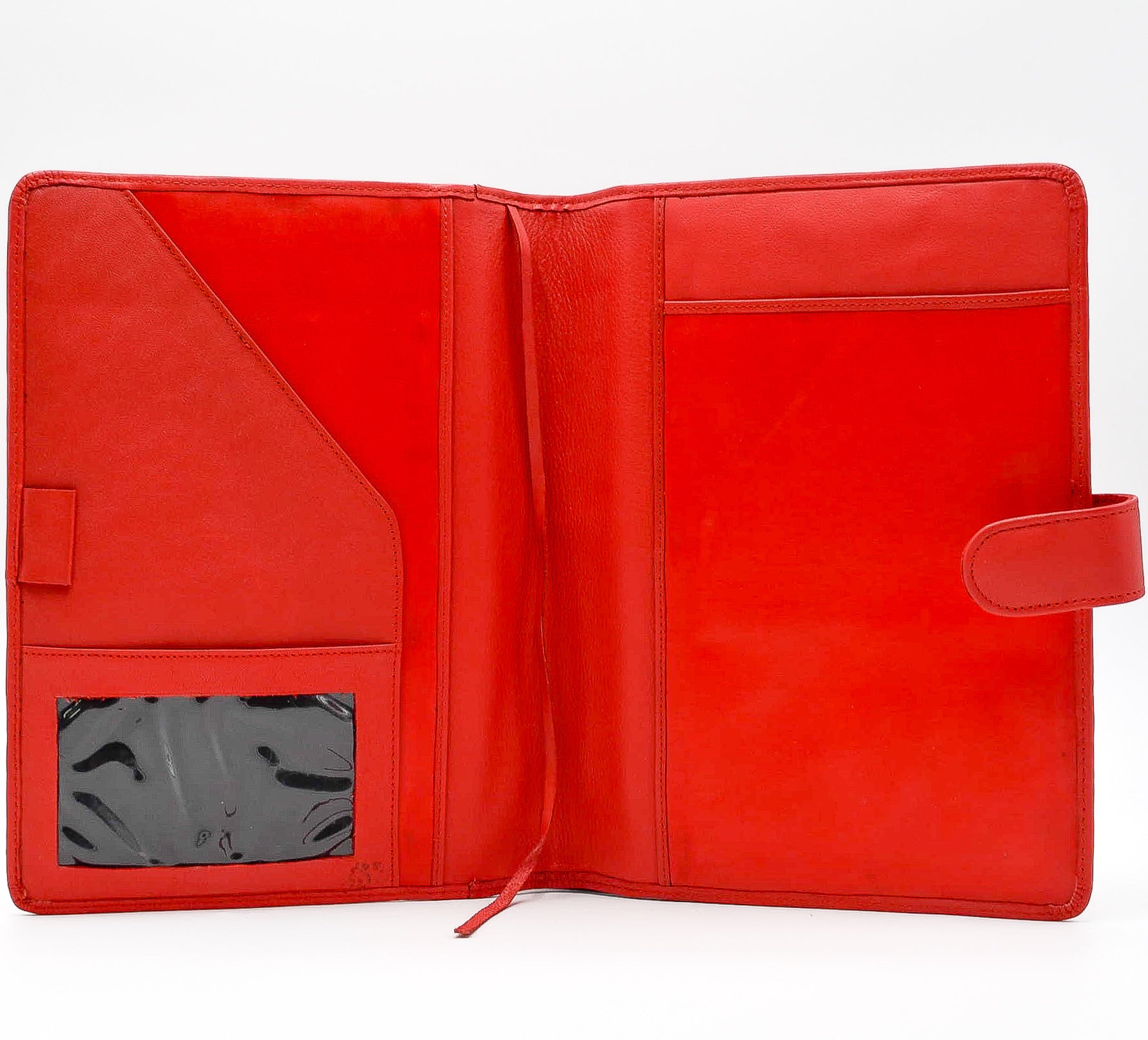 This leather cover is available in British Tan, Red, Burgundy, Green, Black, and Brown. This 7-1/2" x 9-3/4" cover accommodates wire bound and loose leaf inserts with an optional metal 3-ring binder. Keep yourself organized with ease with a snap closure, horizontal note pad holder, clear identification holder, document holder, and leather book mark.