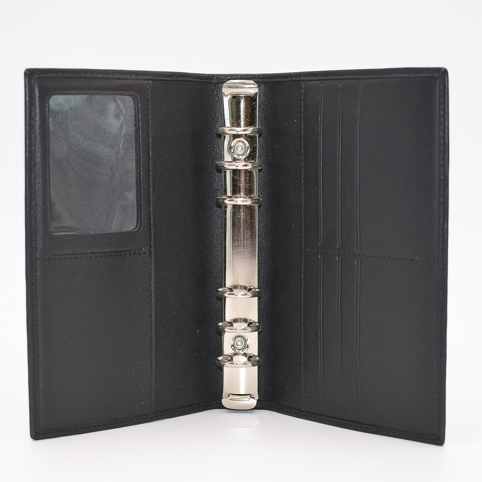Leather 6-ring Cover   This black leather cover includes business card holders, document pocket, and clear Identification holder. This cover has 6 metal rings that accommodate 3-3/4" x 6-3/4" inserts.  Dimensions: 4" x 6-1/2"  Insert Size: 3-3/4" x 6-3/4"  Cover Color: Black  Rings: Metal  Compatible with items: PD646I, MP46P6, MW46P6