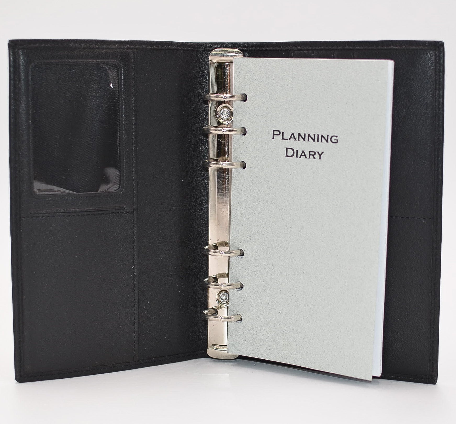 Leather 6-ring Cover   This black leather cover includes business card holders, document pocket, and clear Identification holder. This cover has 6 metal rings that accommodate 3-3/4" x 6-3/4" inserts.  Dimensions: 4" x 6-1/2"  Insert Size: 3-3/4" x 6-3/4"  Cover Color: Black  Rings: Metal  Compatible with items: PD646I, MP46P6, MW46P6