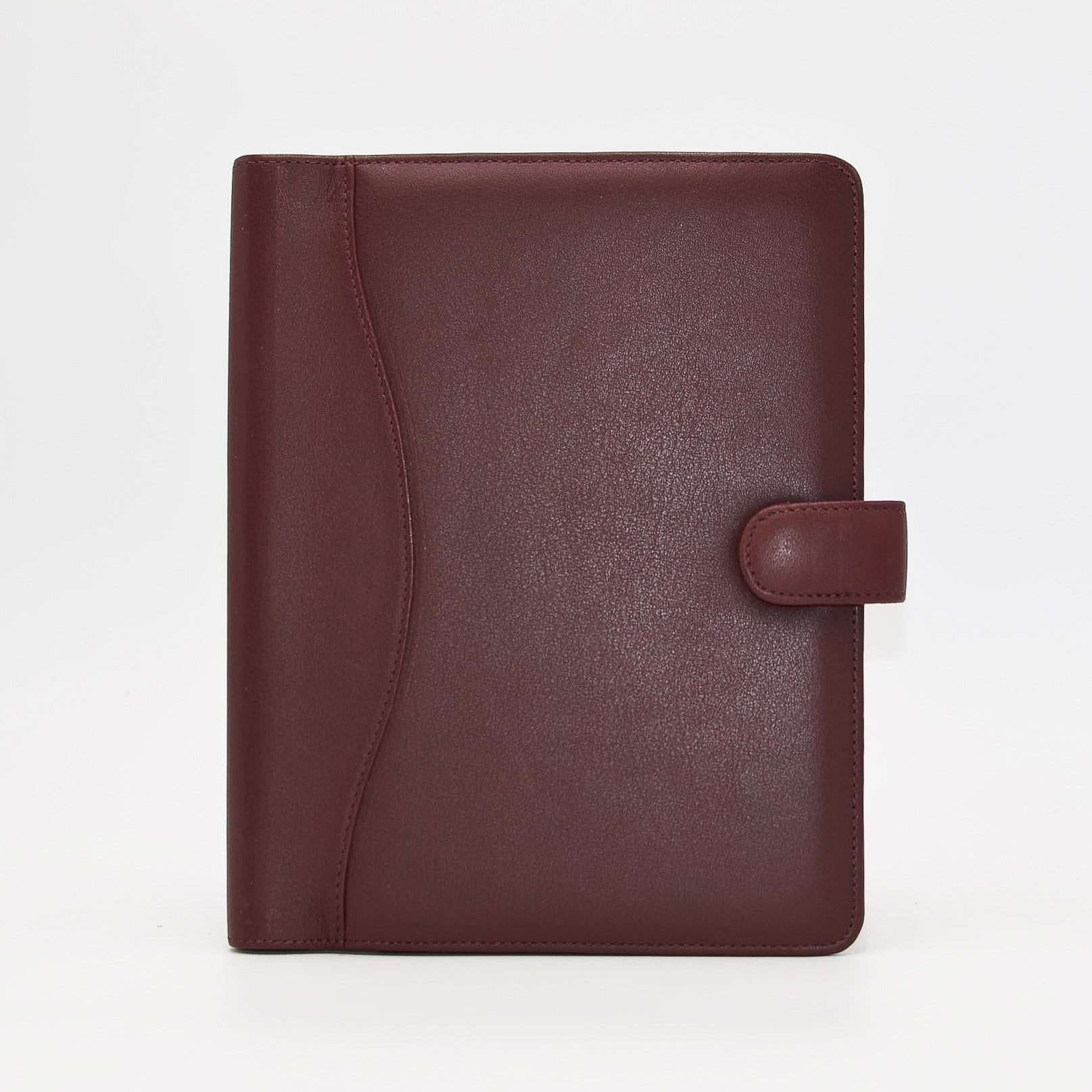 This leather cover is available in British Tan, Red, Burgundy, Green, Black, and Brown. This 7-1/2" x 9-3/4" cover accommodates wire bound and loose leaf inserts with an optional metal 3-ring binder. Keep yourself organized with ease with a snap closure, horizontal note pad holder, clear identification holder, document holder, and leather book mark.
