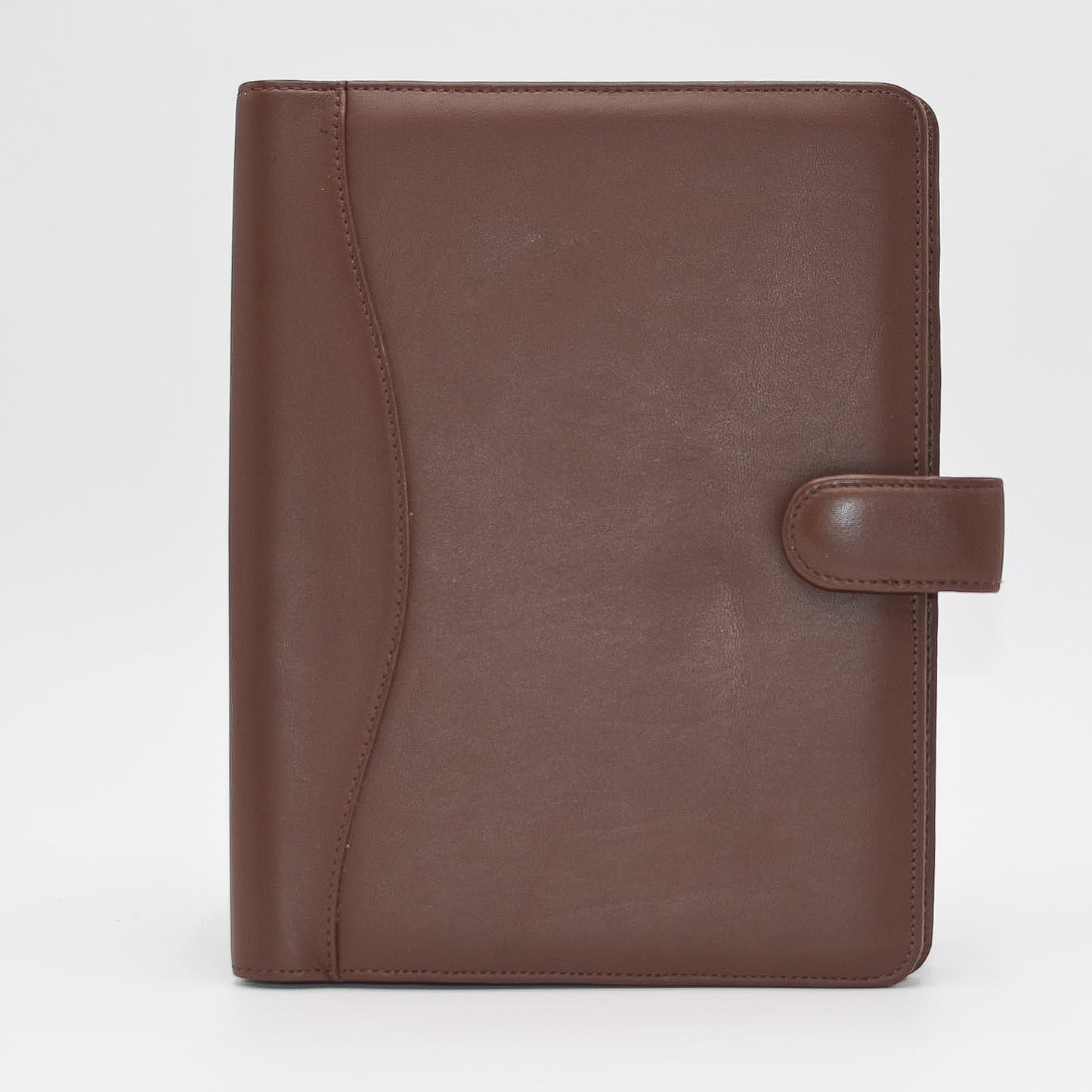 This leather cover is available in British Tan, Red, Burgundy, Green, Black, and Brown. This 7-1/2" x 9-3/4" cover accommodates wire bound and loose leaf inserts with an optional metal 3-ring binder. Keep yourself organized with ease with a snap closure, horizontal note pad holder, clear identification holder, document holder, and leather book mark.
