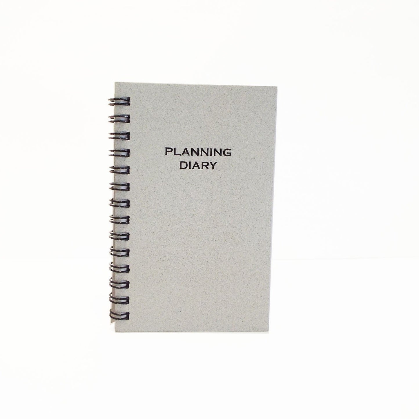 MW35W This wirebound 2021 or 2022 calendar, 3-1/8" x 5" refill has a month-at-a-view portion in the front of the book and a week-at-a-view portion in the back
