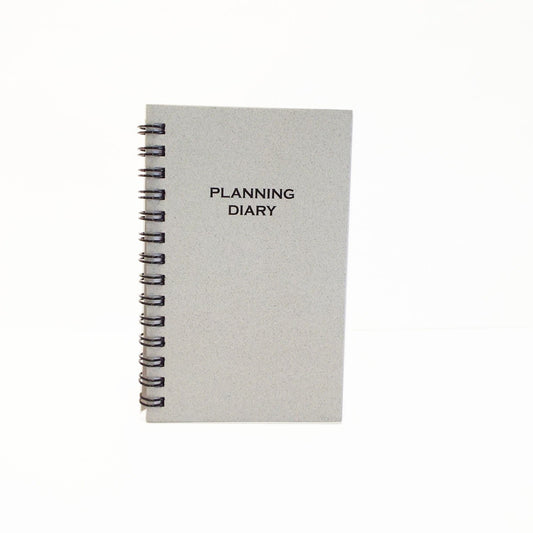 MW35W This wirebound 2021 or 2022 calendar, 3-1/8" x 5"  refill has a month-at-a-view portion in the front of the book and a week-at-a-view portion in the back