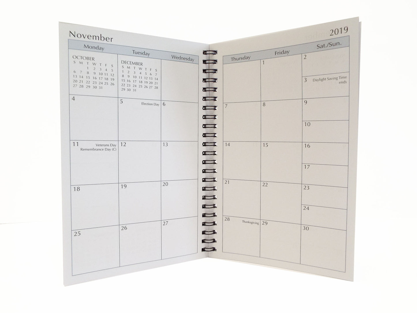 MW58W This wirebound 2021 or 2022 calendar, 5" x 8" refill has a month-at-a-view portion in the front of the book and a week-at-a-view portion in the back.