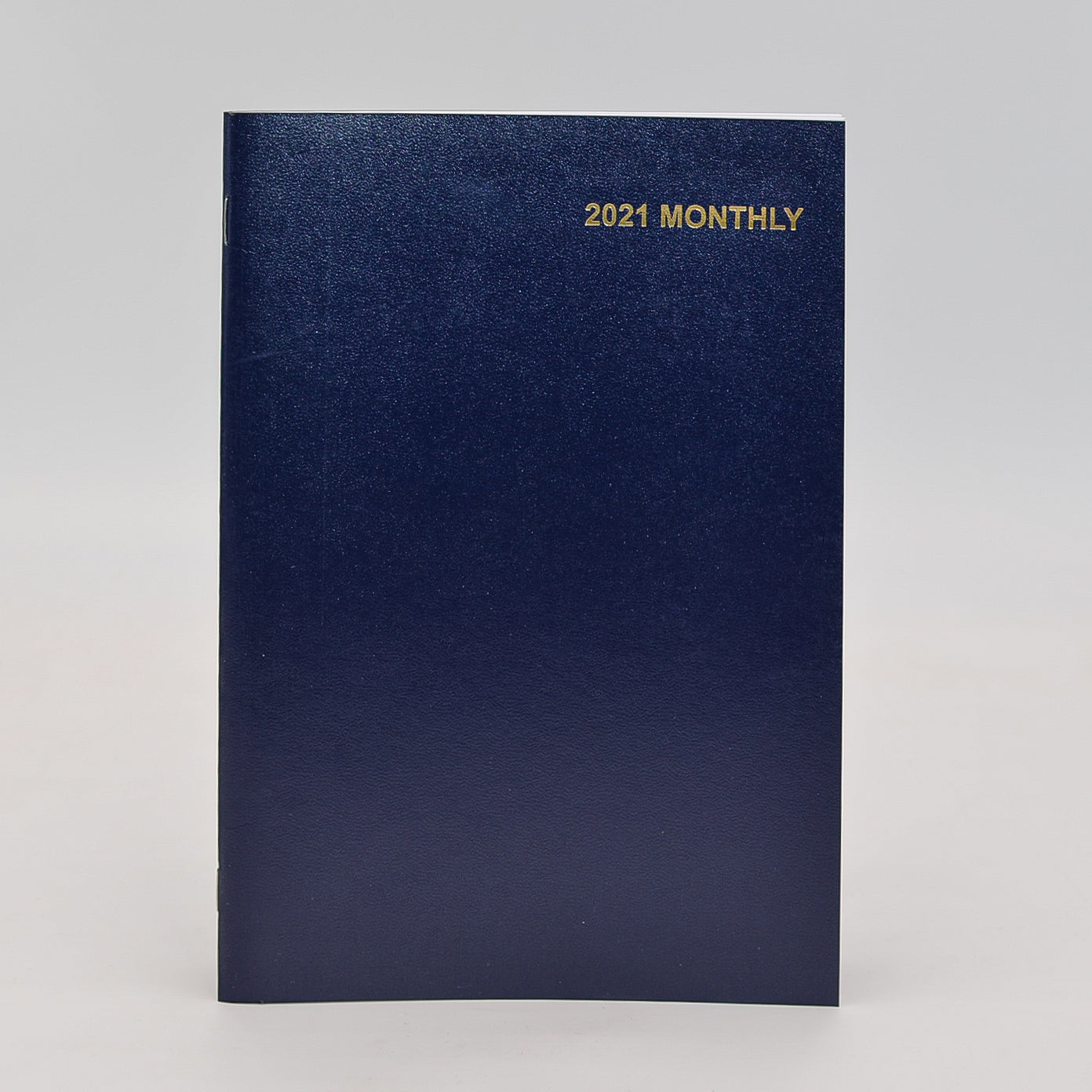 Monthly Calendar: 7" x 10" Staple Bound Leatherette Planner   January 2021-January 2022  Available in Forrest Green and Navy Blue  This Month-at-a-glance calendar includes additional pages, such as: personal information page, three year calendar, future planning for 2021 and 2022, metric conversion, special information, air distances, investment record, dividends & investment record, expense summary, telephone/address, important dates, special dates, area codes/time zones