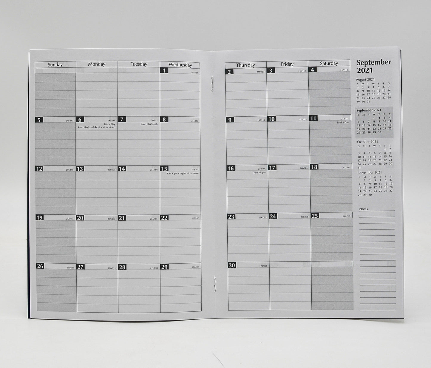 Monthly Calendar: 7" x 10" Staple Bound Leatherette Planner   January 2021-January 2022  Available in Forrest Green and Navy Blue  This Month-at-a-glance calendar includes additional pages, such as: personal information page, three year calendar, future planning for 2021 and 2022, metric conversion, special information, air distances, investment record, dividends & investment record, expense summary, telephone/address, important dates, special dates, area codes/time zones