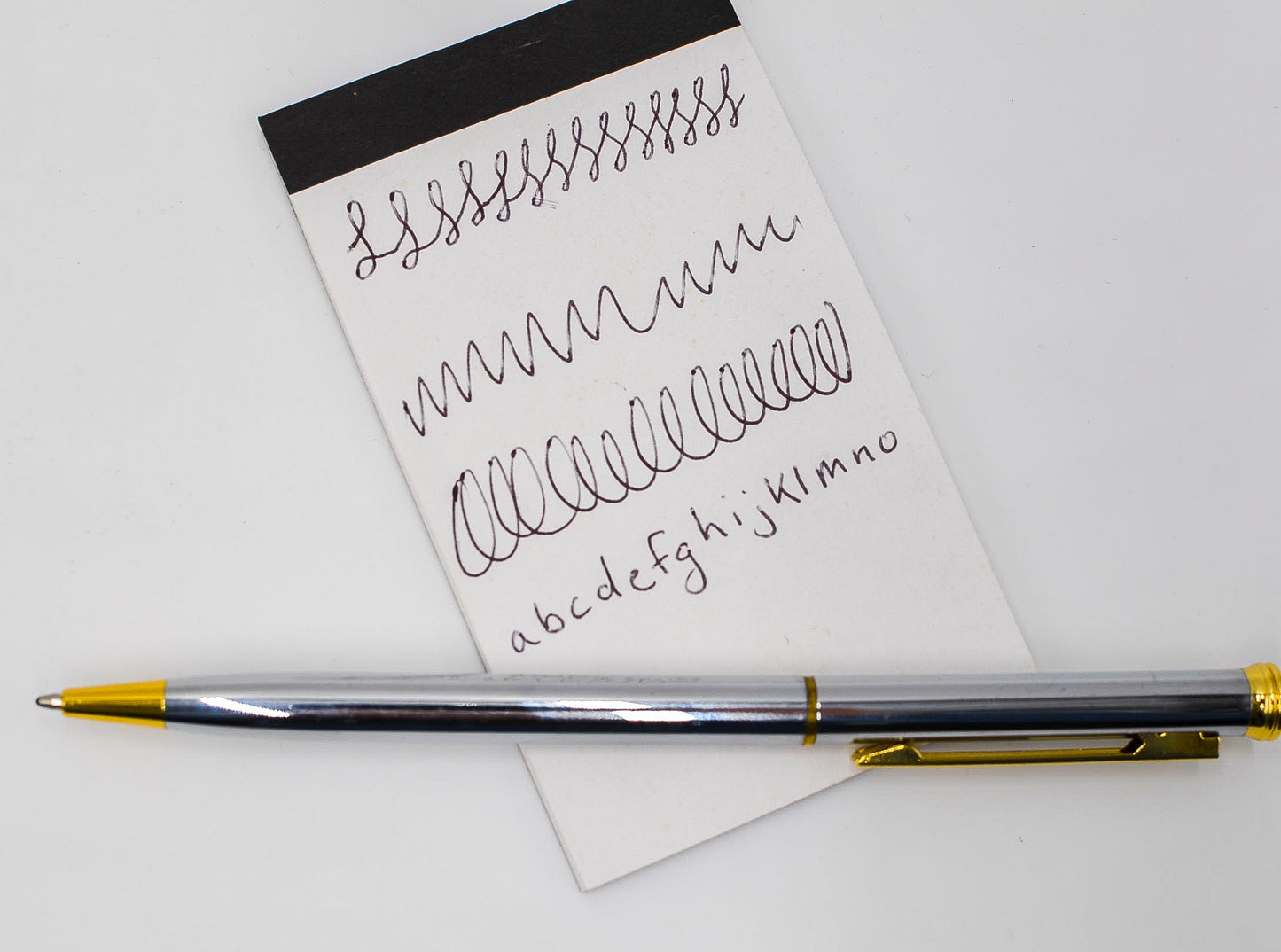 Pens: Silver and Gold Ballpoint Pen with Black Ink